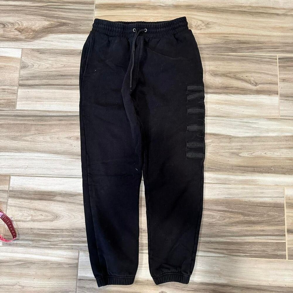 all black kith nyc spell out embroidered jogger sweatpants